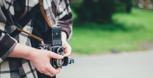 A person holding a camera
